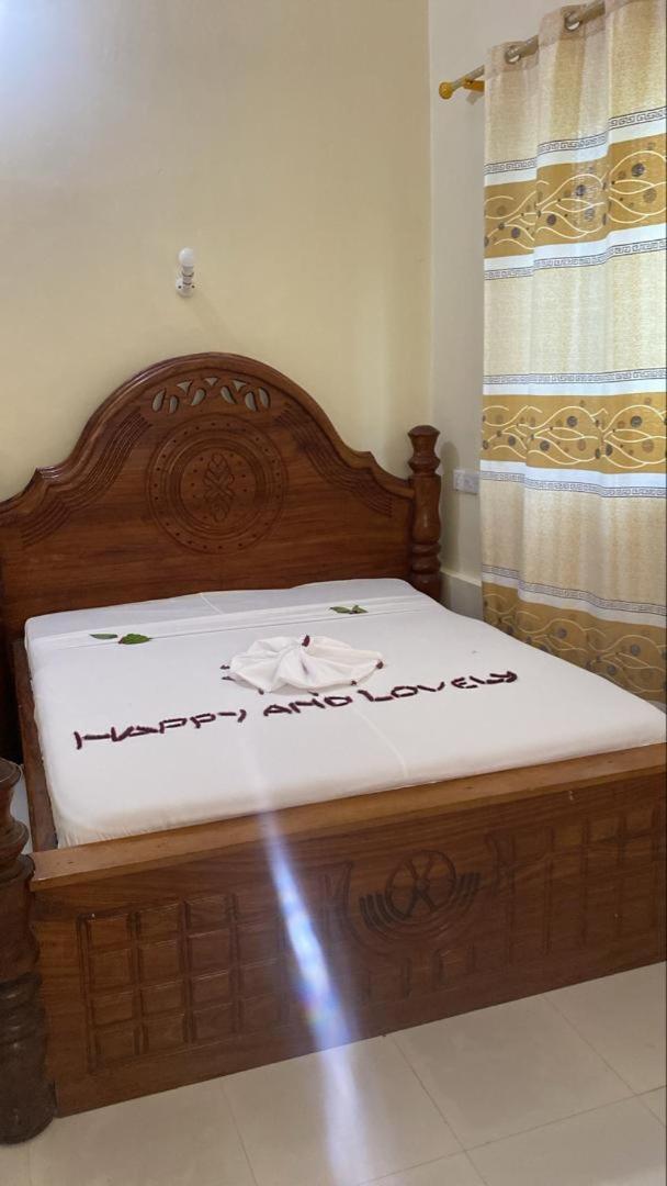 Bed and breakfast Falcon House Kendwa Chambre photo
